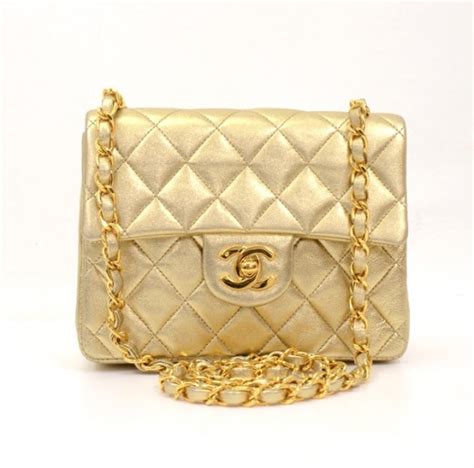 chanel gold quilted metallic leather mini curved flap bag